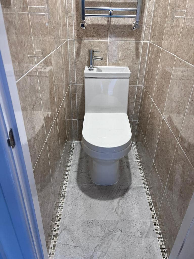 Cloakroom 2: View 2. Toilet with sink on top