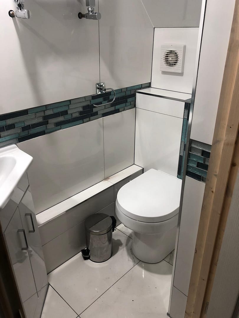 WC and corner sink unit in cloakoom