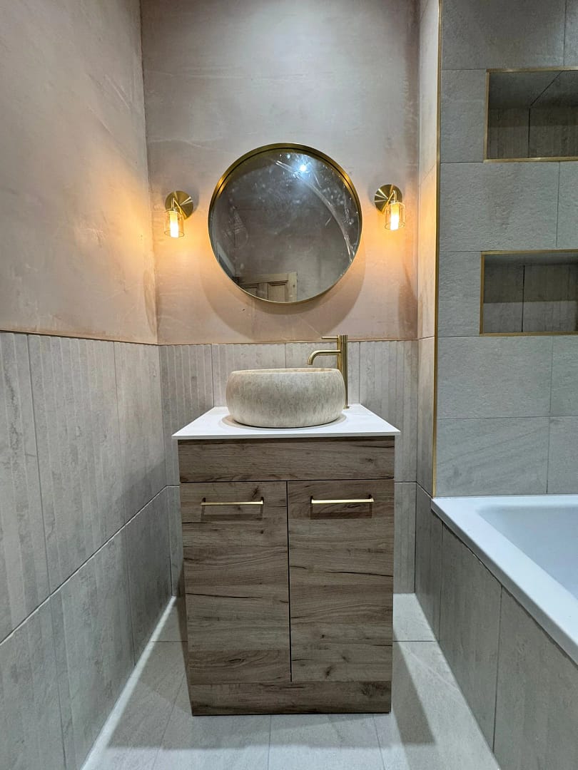 Refurbished bathroom 3 showing sink and vanity unit